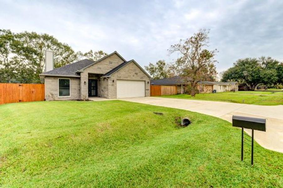 Front exterior of a new home in , League City, TX, highlighting curb appeal (Image 2). Front exterior of a new home in , League City, TX, highlighting curb appeal (Image 2).