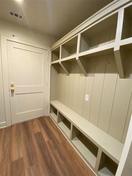 Mudroom featuring dark wood-type flooring