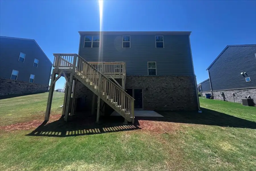 Exterior details and patio area of a home in Southern Hills, McDonough (Image 2).