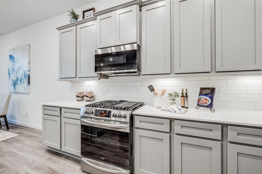 Furnished interior view inside a new home in Bridgeland, Cypress (Image 10).