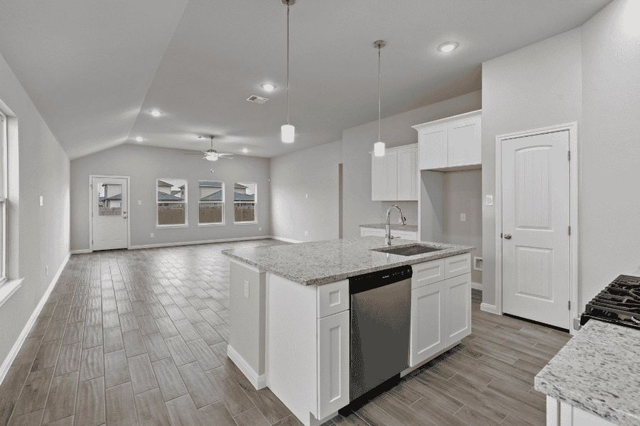 Representative furnished interior of a home built from the Mia by Saratoga Homes in Enclave at Dobbin, Magnolia (Image 3). Representative furnished interior of a home built from the Mia by Saratoga Homes in Enclave at Dobbin, Magnolia (Image 3).