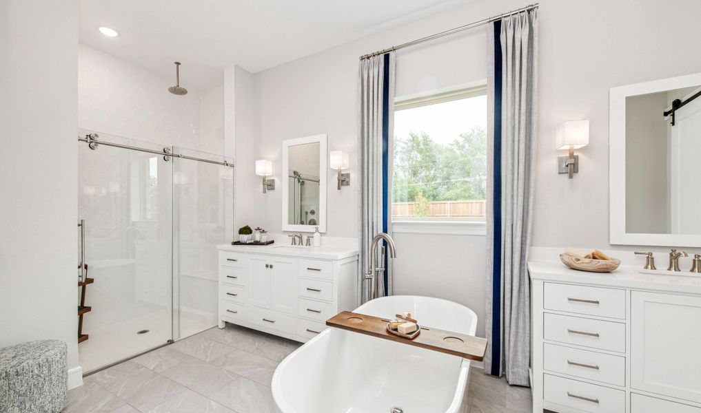 Primary bath with glass shower enclosure