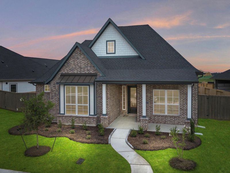 Front exterior of a new home in Riceland, Mont Belvieu, TX, highlighting curb appeal (Image 2).