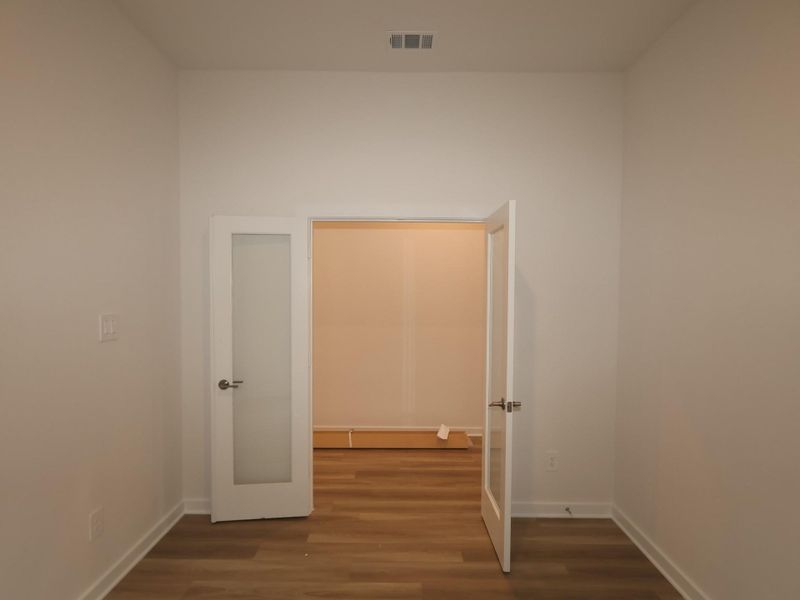 Spacious, unfurnished interior of a new home in Pinewood at Grand Texas, New Caney (Image 18).