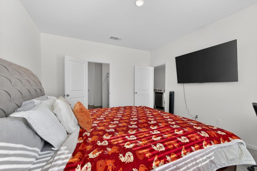 Furnished interior view inside a new home in Harrington Trails at The Canopies, New Caney (Image 31).
