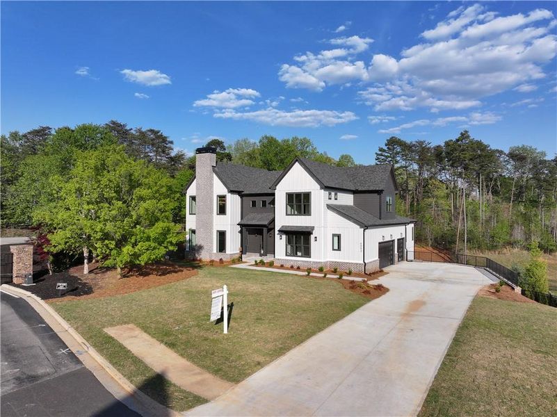 Front exterior of a new home in , Gainesville, GA, highlighting curb appeal (Image 28).