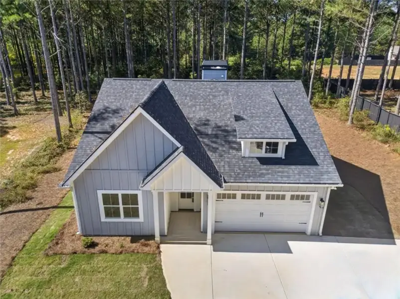 Front exterior of a new home in , Dallas, GA, highlighting curb appeal (Image 2). Front exterior of a new home in , Dallas, GA, highlighting curb appeal (Image 2).