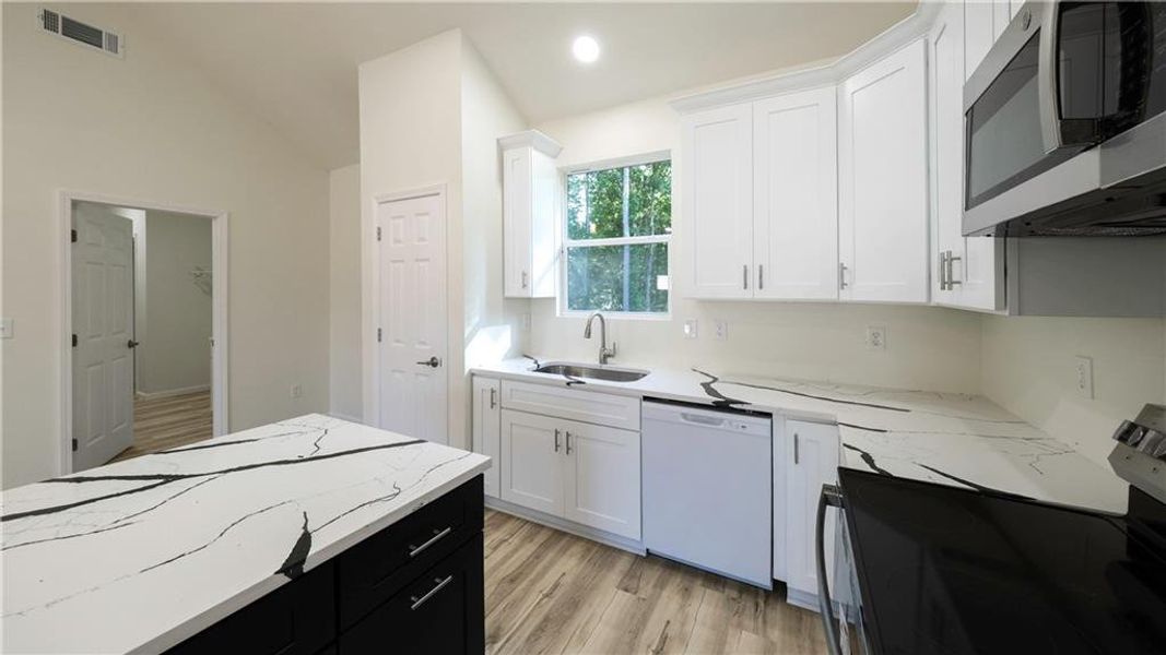 Furnished interior view inside a new home in , Carrollton (Image 7).