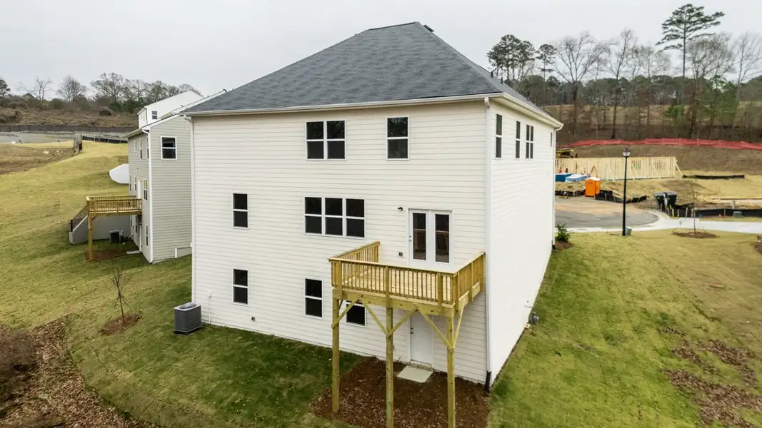 Exterior details and patio area of a home in Brooks Station, Dacula (Image 3).