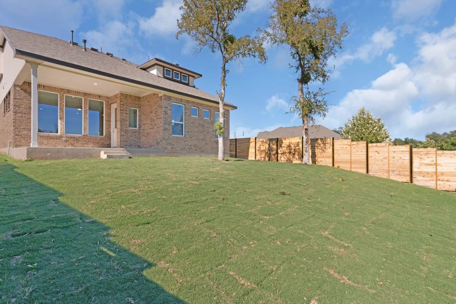 Exterior details and patio area of a home in Highland Village, Georgetown (Image 3).
