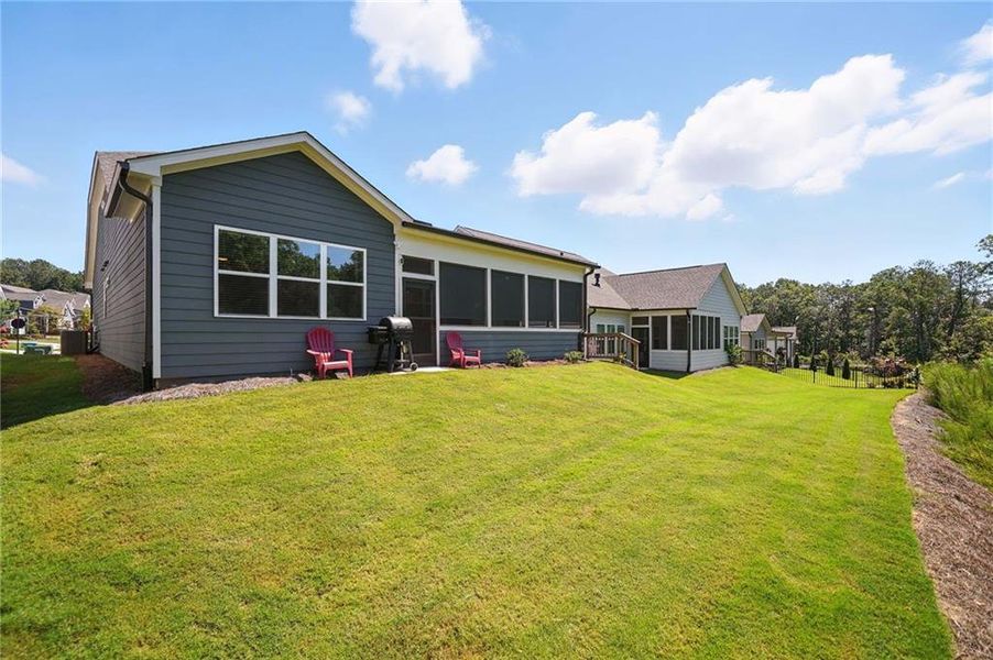 Front exterior of a new home in Hickory Bluffs, Canton, GA, highlighting curb appeal (Image 2). Front exterior of a new home in Hickory Bluffs, Canton, GA, highlighting curb appeal (Image 2).