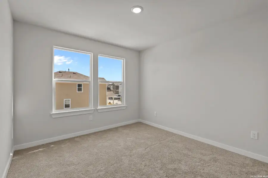 Spacious, unfurnished interior of a new home in Senna, Leon Valley (Image 18).