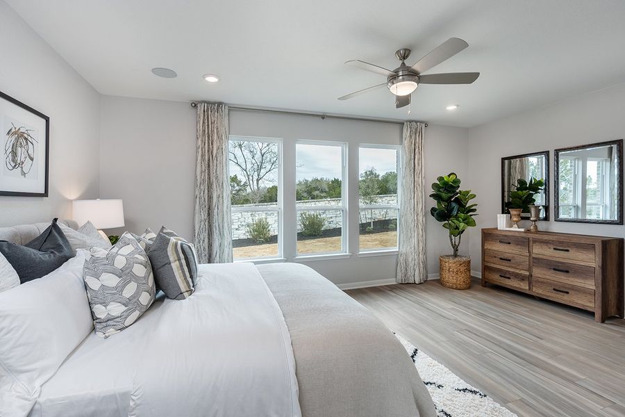 Representative furnished interior of a home built from the Bordeaux by Taylor Morrison in Travisso, Leander (Image 8).