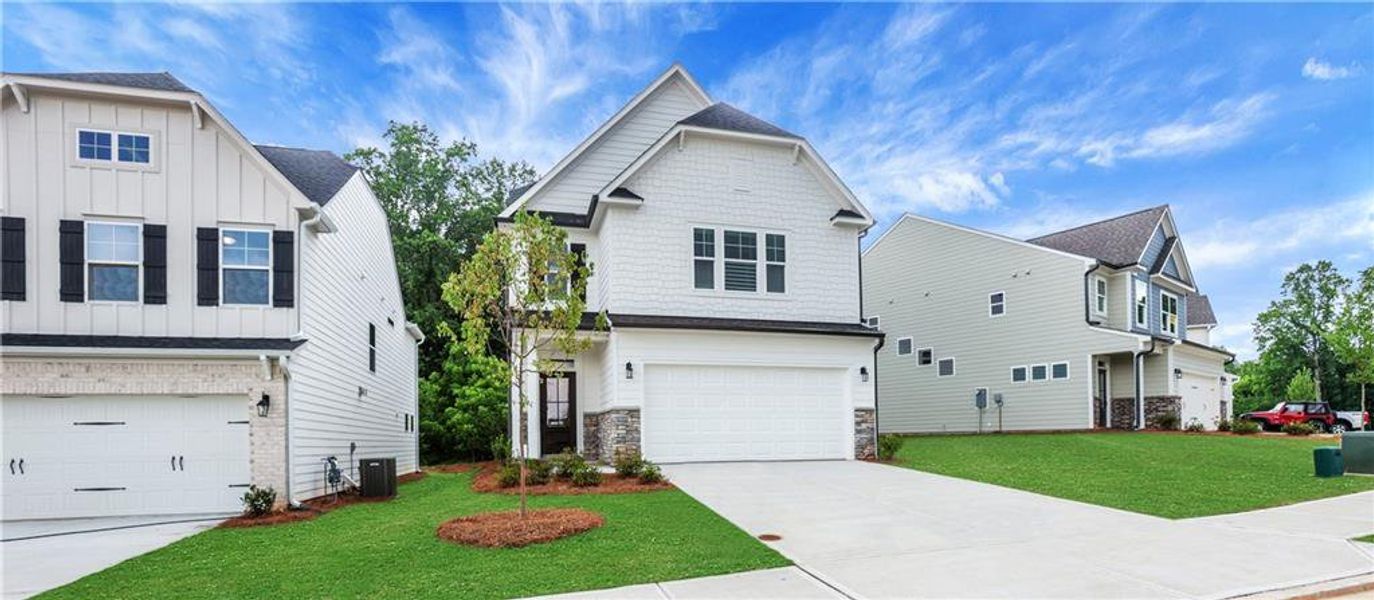 Front exterior of a new home in Villas at Dawsonville, Dawsonville, GA, highlighting curb appeal (Image 25).