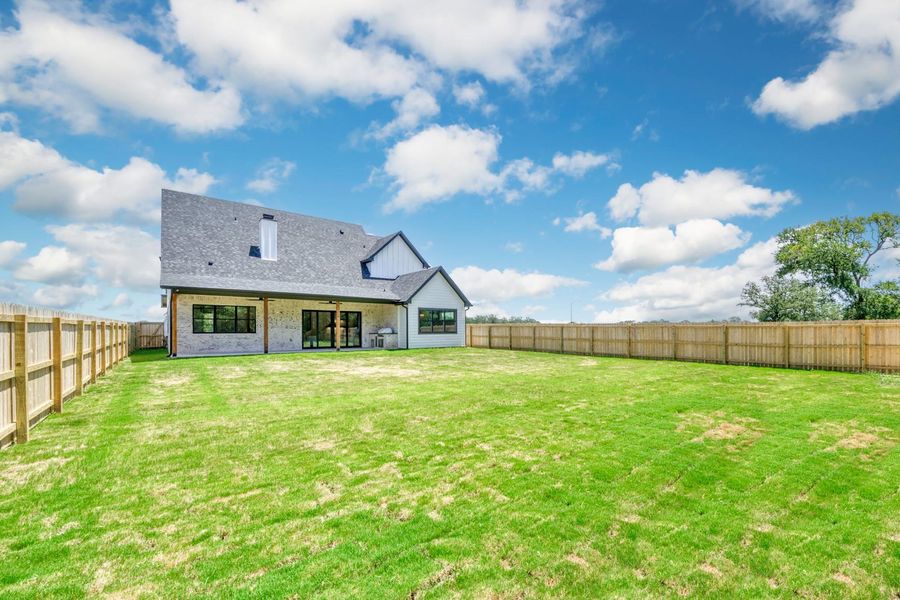Front exterior of a new home in , Somerville, TX, highlighting curb appeal (Image 23). Front exterior of a new home in , Somerville, TX, highlighting curb appeal (Image 23).