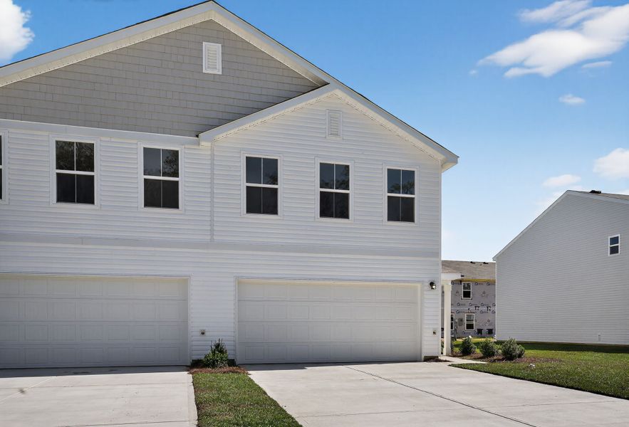 Exterior details and patio area of a home in Graystone Townhomes, Florence (Image 3). Exterior details and patio area of a home in Graystone Townhomes, Florence (Image 3).