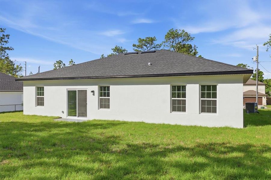 Exterior details and patio area of a home in , Citrus Springs (Image 25).