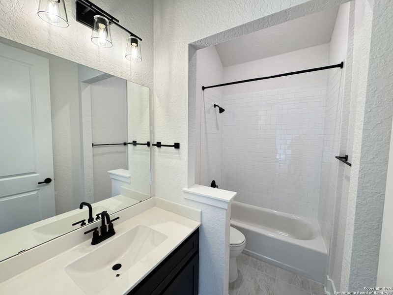 Furnished interior view inside a new home in Megan's Landing 70's, Castroville (Image 11).