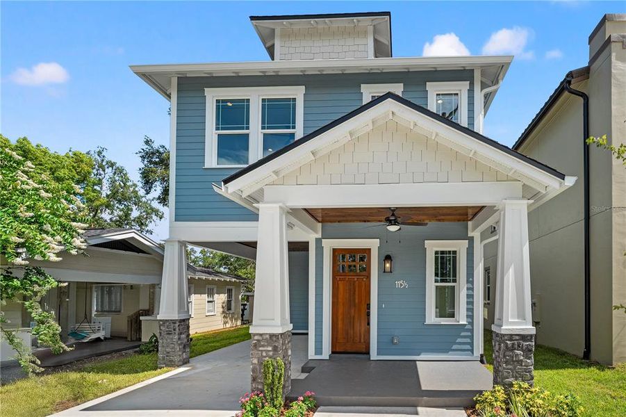 Front exterior of a new home in , Tampa, FL, highlighting curb appeal (Image 26).