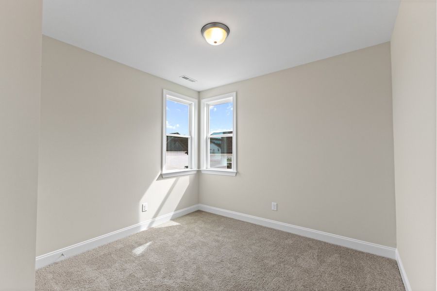 Representative unfurnished interior of a home built from the The Juniper by RobuckHomes in Kennebec Crossing, Angier (Image 103).