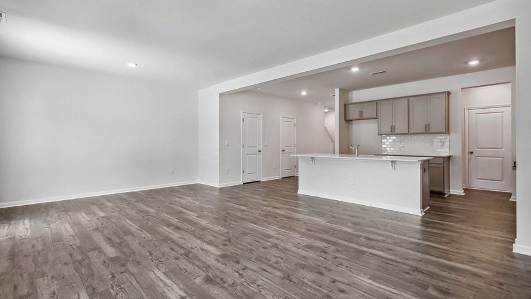 Representative unfurnished interior of a home built from the DANIEL by D.R. Horton in The Townes Park, Apex (Image 12). Representative unfurnished interior of a home built from the DANIEL by D.R. Horton in The Townes Park, Apex (Image 12).