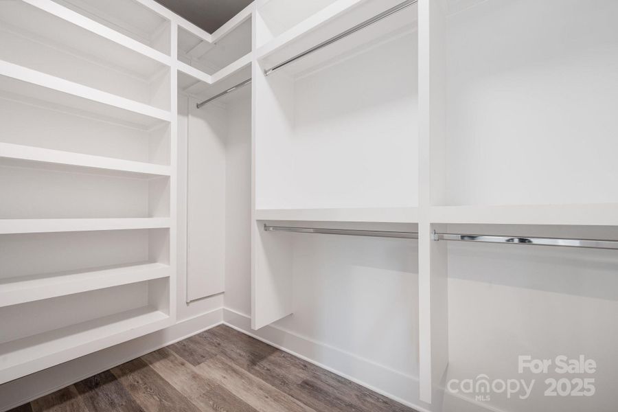 All bedroom closets have wooden shelves