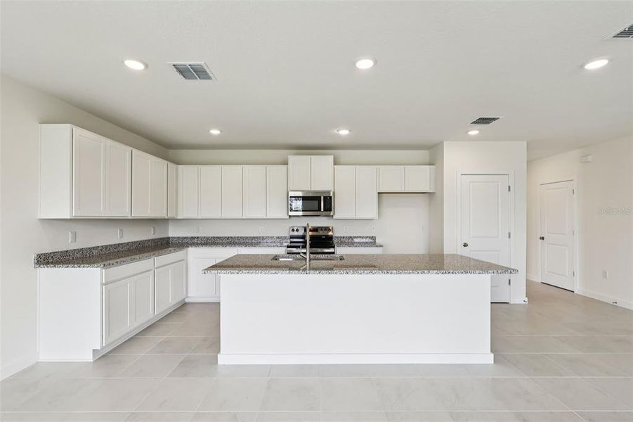 Furnished interior view inside a new home in Willowbrook North, Winter Haven (Image 10).