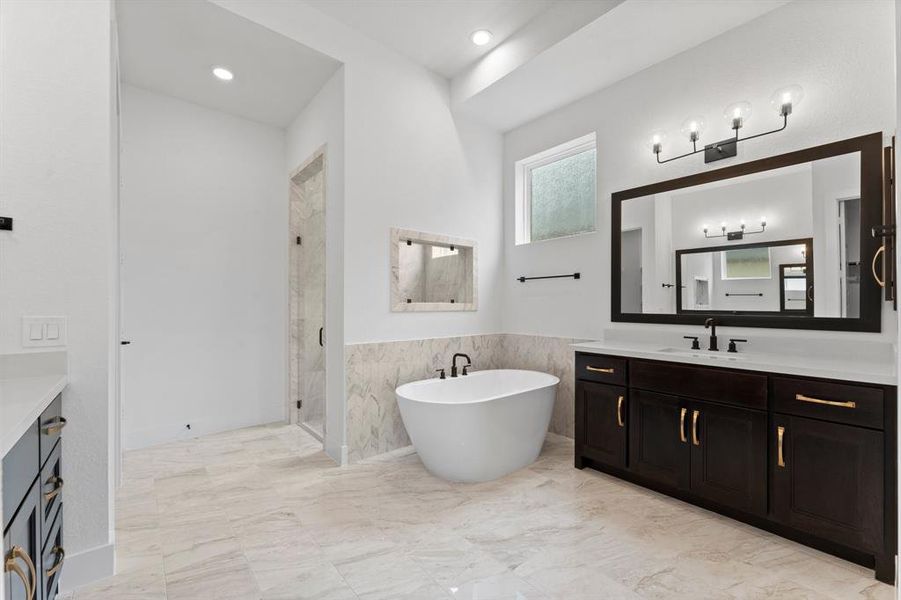 Primary Bath with Separate Vanities and Separate Tub and Shower