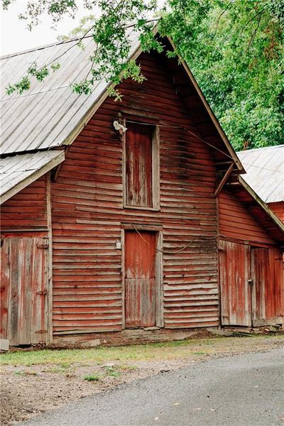 Front exterior of a new home in Rosewood Lake Estates, Hoschton, GA, highlighting curb appeal (Image 57).