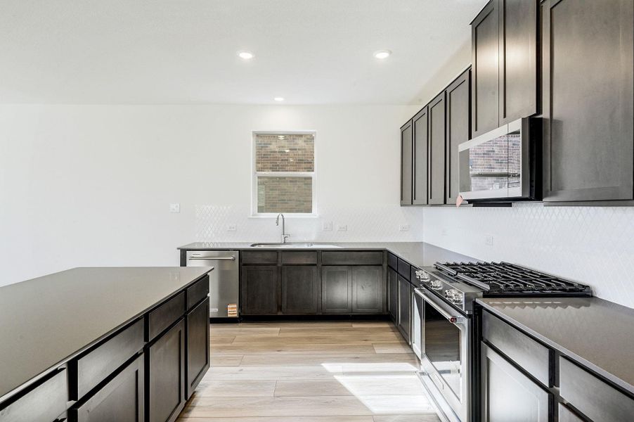 Furnished interior view inside a new home in Salerno - Classic Collection, Round Rock (Image 12). Furnished interior view inside a new home in Salerno - Classic Collection, Round Rock (Image 12).