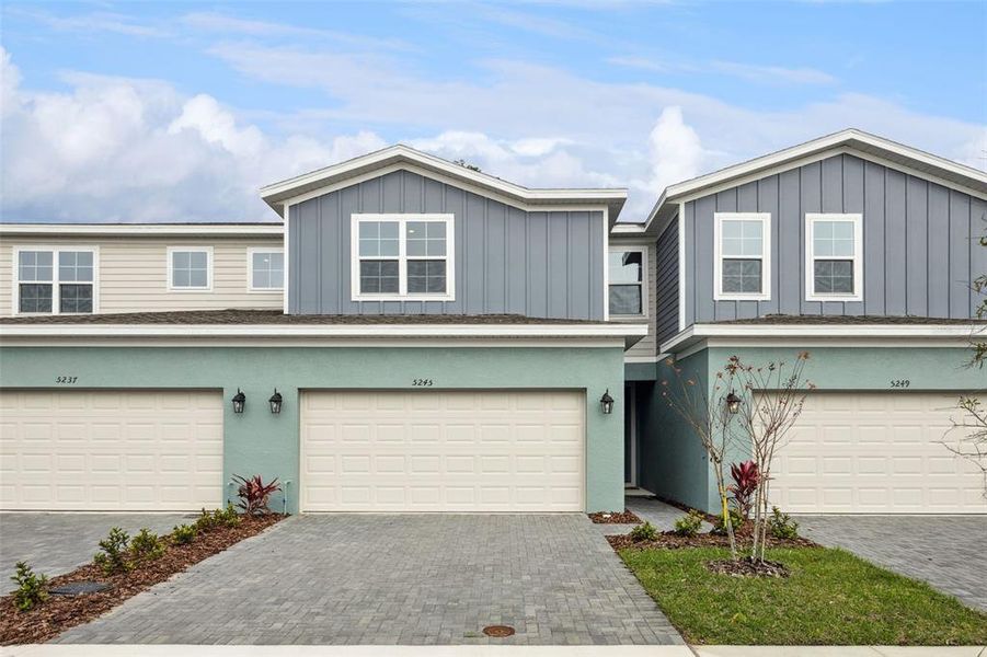 Front exterior of a new home in Terra Haven, St. Cloud, FL, highlighting curb appeal (Image 25).