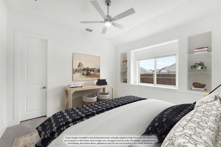 Bedroom with vaulted ceiling, ceiling fan, built-in shelves, and large window with natural light