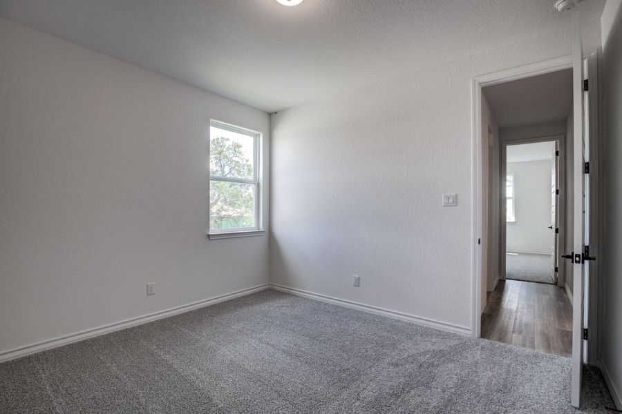 Representative unfurnished interior of a home built from the The Lanier F by Davidson Homes LLC in The Reserve at Potranco Oaks, Castroville (Image 26).