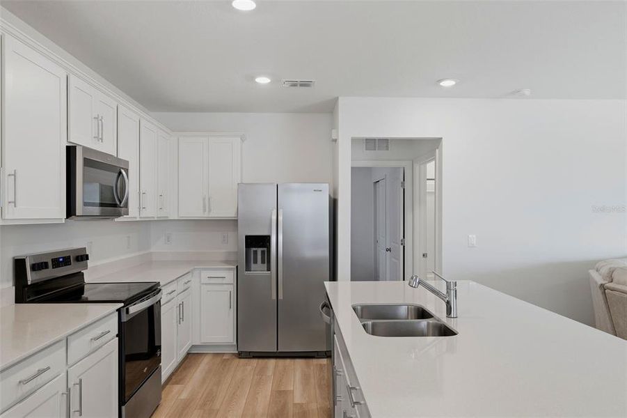 Furnished interior view inside a new home in Oakfield Lakes, Parrish (Image 8).