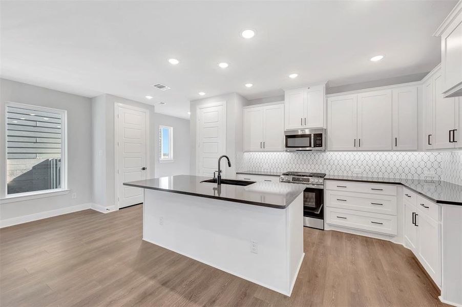 Furnished interior view inside a new home in Painted Tree Woodland West – Cottages, McKinney (Image 11).