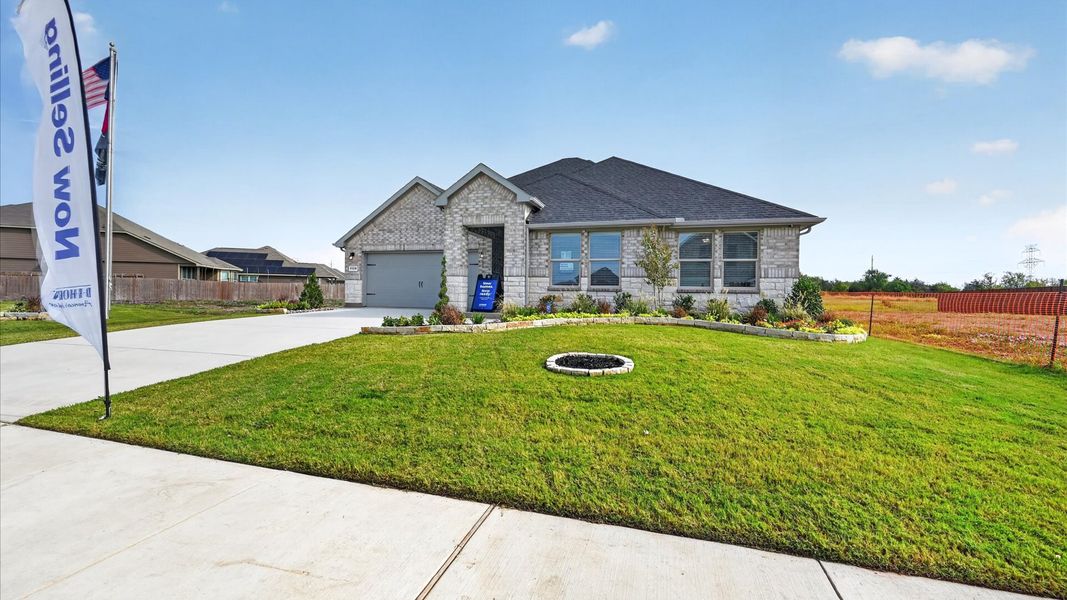 Representative exterior photo of a completed home built from the Dillon by D.R. Horton in Parkerville Meadows, DeSoto, TX (Image 22).