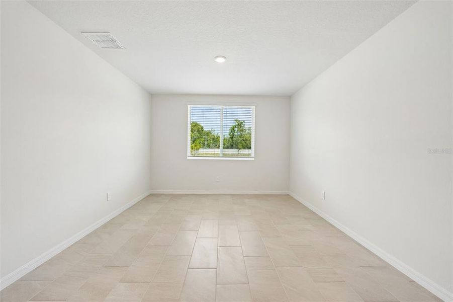 Spacious, unfurnished interior of a new home in Pine Ridge Meadows, Hudson (Image 54).