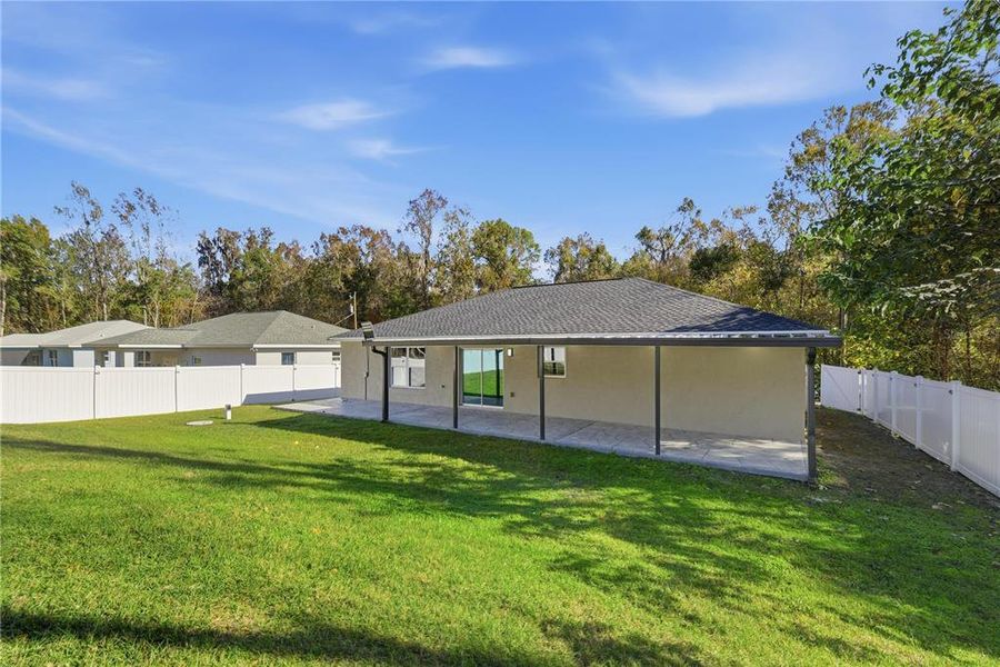 Exterior details and patio area of a home in , Belleview (Image 19).
