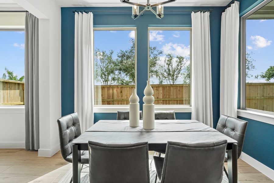 Furnished interior view inside a new home in Bridgeland, Cypress (Image 56).