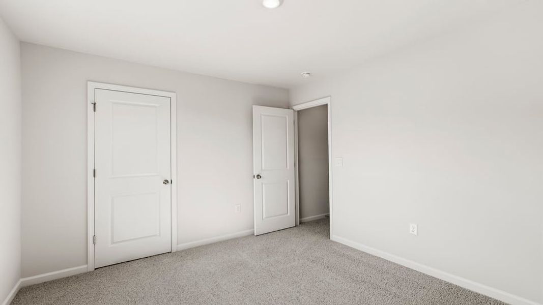 Spacious, unfurnished interior of a new home in Sherwood Gardens, Landrum (Image 31).