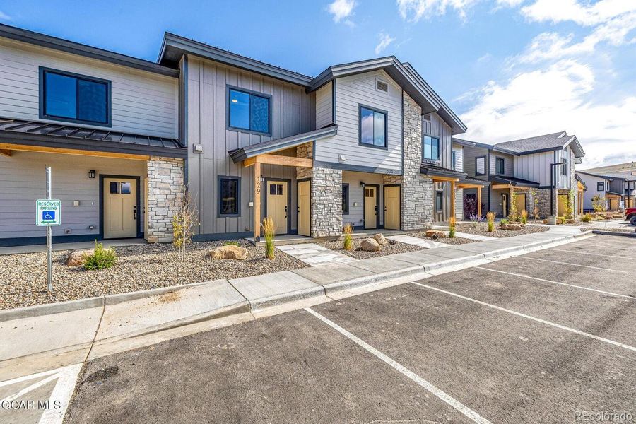 Front exterior of a new home in , Granby, CO, highlighting curb appeal (Image 22).