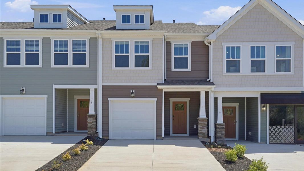 Desirable location and established charm in this superior two-story villa community near Downtown Greenville