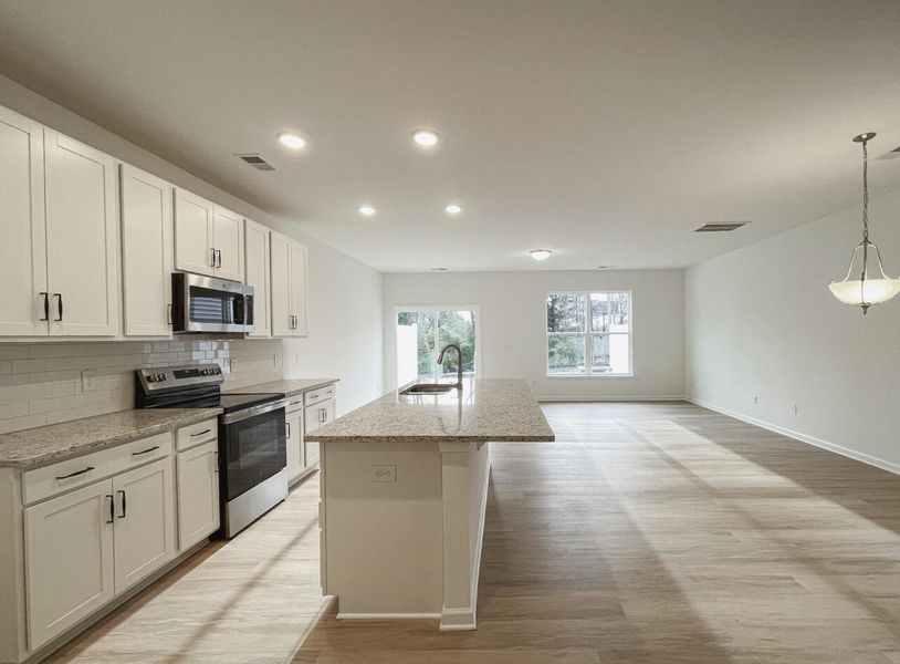 Furnished interior view inside a new home in East Main Townes, Spartanburg (Image 5).