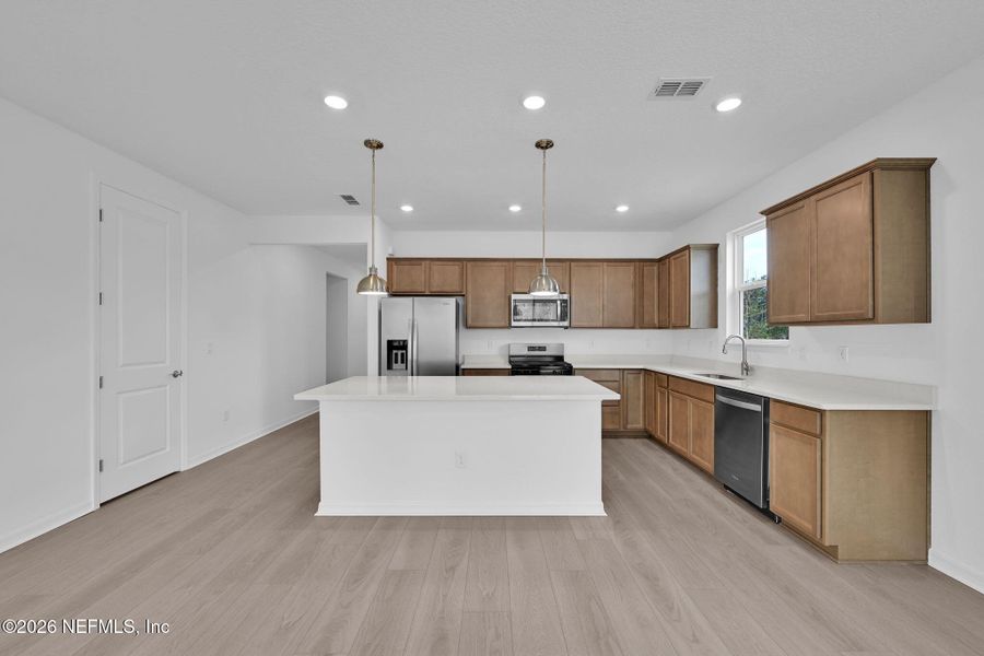 Furnished interior view inside a new home in Westerly Park at Wildlight, Yulee (Image 9).