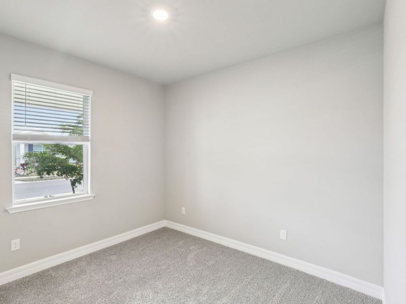 Spacious, unfurnished interior of a new home in Crescent Lakes - Reserve Series, Punta Gorda (Image 15).