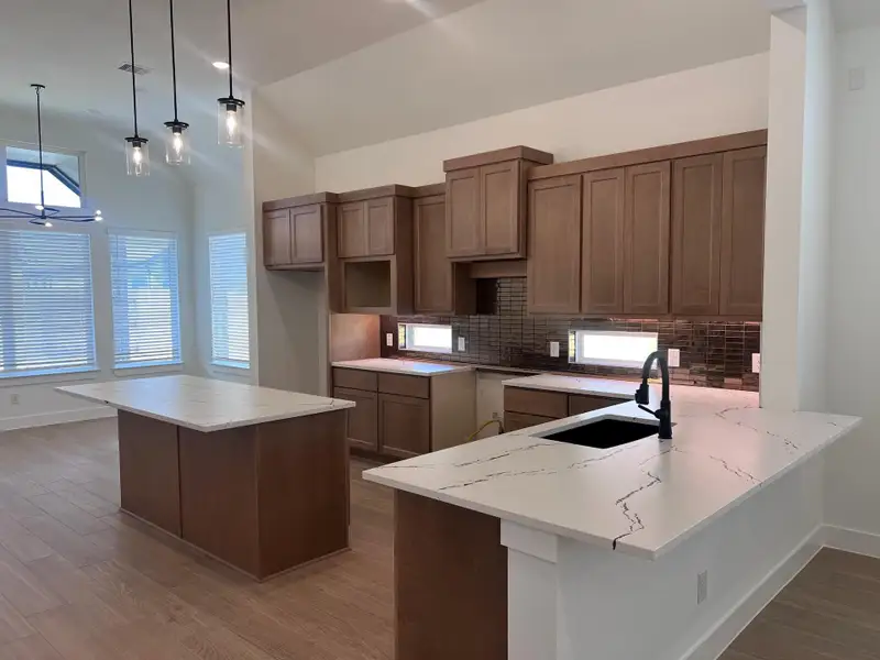 Furnished interior view inside a new home in Wood Leaf Reserve, Tomball (Image 5).