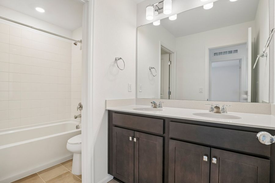 Furnished interior view inside a new home in Windler, Aurora (Image 9).