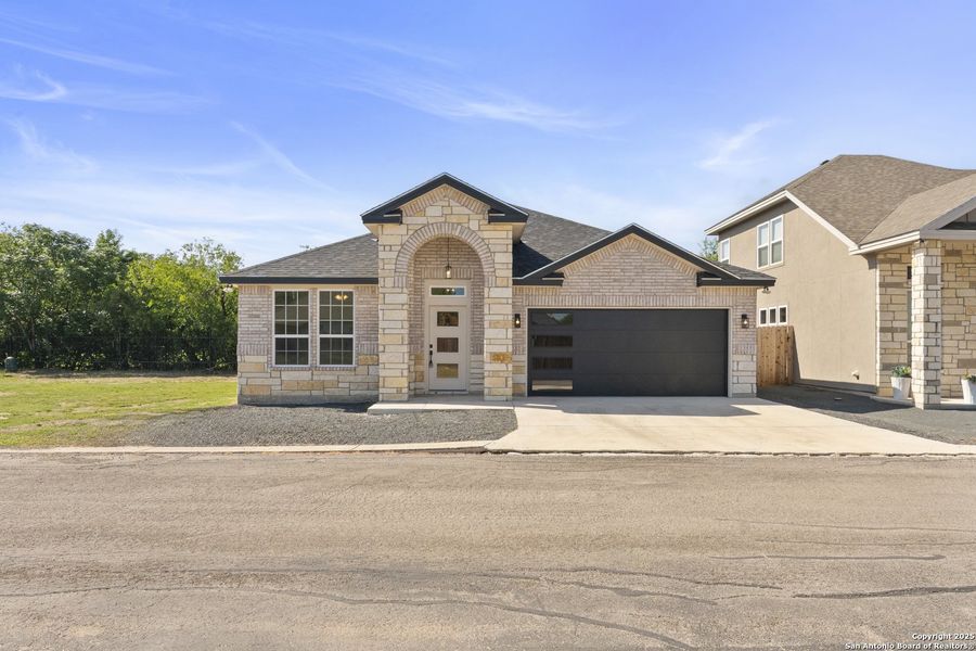 Front exterior of a new home in , Uvalde, TX, highlighting curb appeal (Image 20). Front exterior of a new home in , Uvalde, TX, highlighting curb appeal (Image 20).
