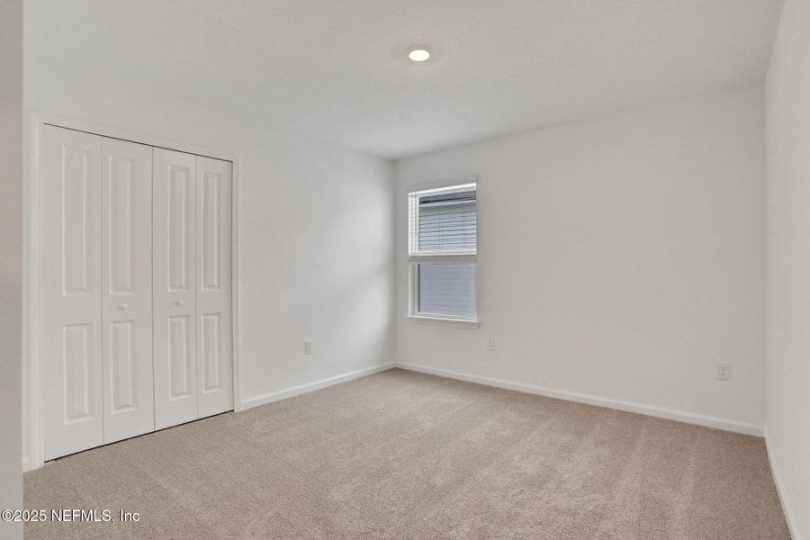 Spacious, unfurnished interior of a new home in TrailMark, St. Augustine (Image 32).