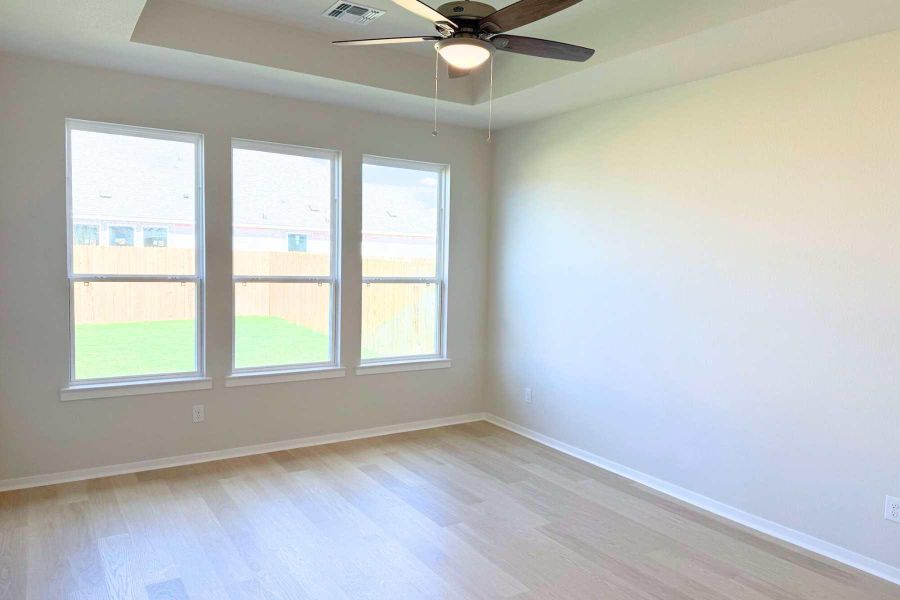 Bathroom featuring a marble finish shower and a closet Bathroom featuring a marble finish shower and a closet